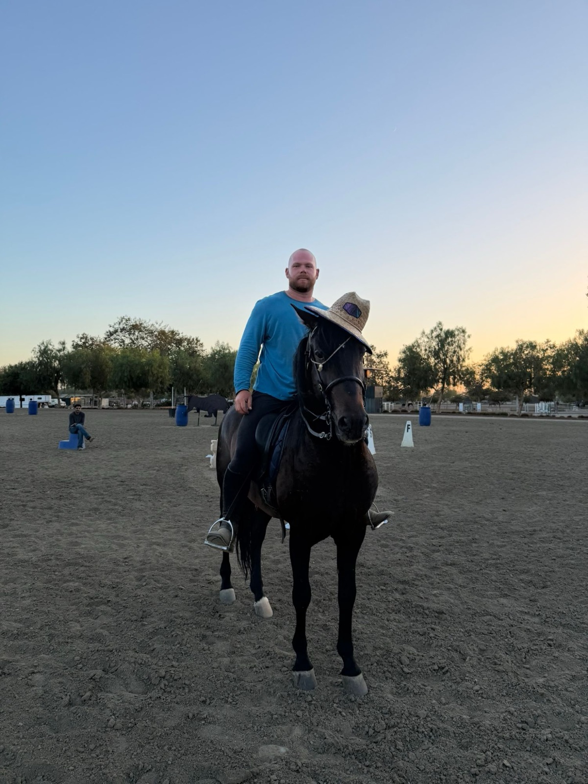 Rider and horse at sunset in the Hansen Dam arena